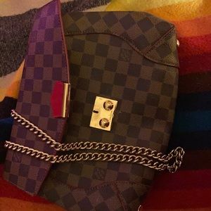 1Authentic  real Louis Vuitton purse $1,800